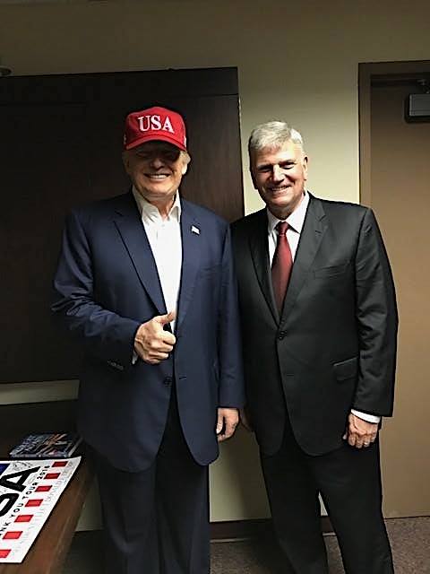 Graham standing next to the US President-elect Donald Trump. (Photo: Graham Facebook Account)